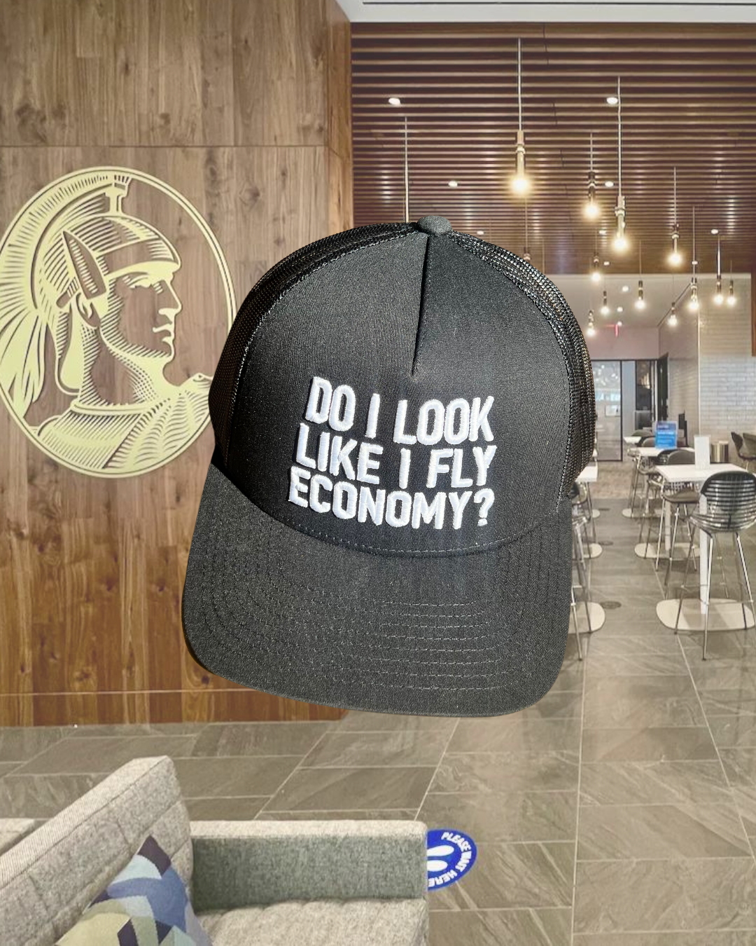 DO I LOOK LIKE I FLY ECONOMY? TRUCKER