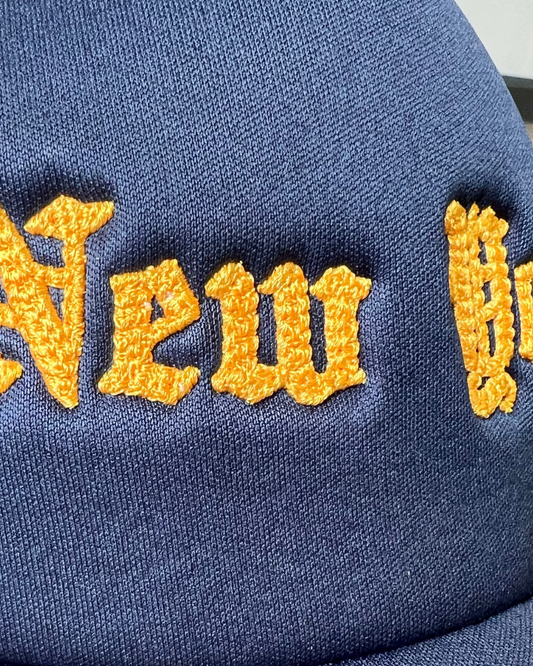 Navy Chainstitch New York Curved Bill Trucker