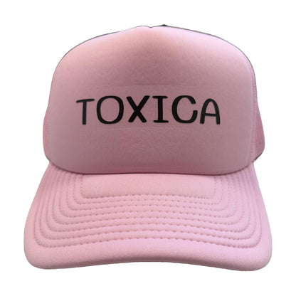 Toxica pink trucker hat with black lettering, front view, by Di Snapback